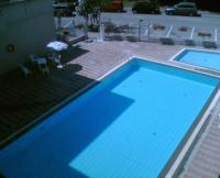 Comfy flat with terrace by the pool - B&B Rosolina Mare