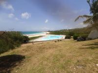 Studio face mer, piscine et plage par escalier - Ferienwohnung