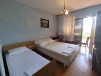Four-Bedroom Apartment with Balcony