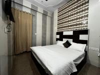 Chambre Double Deluxe (2 Adultes + 1 Enfant)