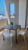 Yellow flowers Comfy Homes with Lift & Parking Garage - B&B Polignano a Mare