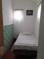 Camera Tripla con Servizi Igienici in Comune