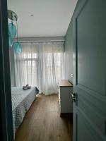 Two-Bedroom Apartment with Balcony