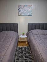 Basic Dreibettzimmer mit Gemeinschaftsbad