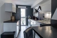 Appartement bien équipé avec parking, Lyon 8 - Chambres d’hôtes Vénissieux
