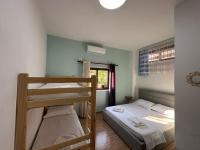 Chambre Quadruple avec Salle de Bains Privative