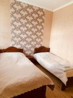Dreibettzimmer mit Bergblick