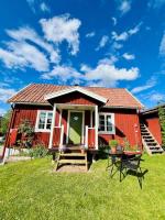 Mysig stuga med sjöutsikt - B&B