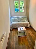 Petit appartement idéal pour deux personnes, offrant une belle vue sur jardin, proche des commodités et à moins de 30 minutes de Paris en transport - Ferienwohnung