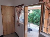 Camera Familiare con Vista Giardino