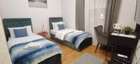 Tweepersoonskamer met 2 Aparte Bedden