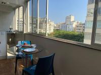 Quarto e sala vista Cristo e mar de Copacabana - Bed and Breakfast Rio de Janeiro