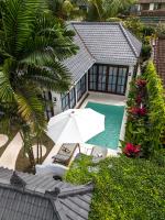 Moonlight by EVDEkimi - Stylish 2BR escape with Tropical garden and Pool - B&B Ubud