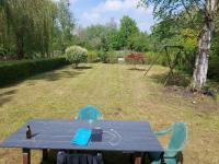 Hortillonnages Chalet entouré d'eau - Bed and Breakfast