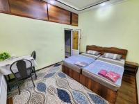 Tweepersoonskamer met 2 Aparte Bedden en Badkamer