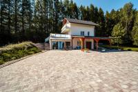 Domek przy Modrzewiach - B&B