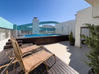 Piscina, churrasqueira, garagem, sauna e academia! - B&B Capão da Canoa