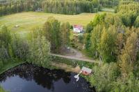 Järvimökki perinteisellä rantasaunalla - B&B Kissala
