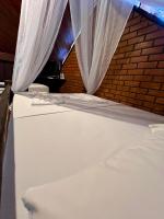 Budget Dreibettzimmer mit externem Bad