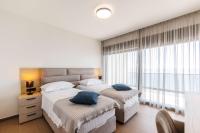 Deluxe Tweepersoonskamer met 2 Aparte Bedden en Uitzicht op Zee