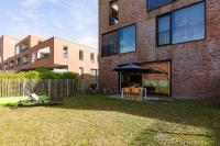 Huswell - Cozy Beach Apartment with Garden - Chambres d’hôtes