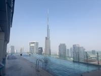 Escape24 Spacious 2BR Infinity Pool with Burj Views - Bed and Breakfast Dubai