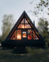 Two Black Cabins - Bed and Breakfast Pabaži