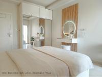 One-Bedroom Apartment with Balcony and Mountain View
