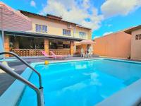 Casa com Piscina próximo ATRATIVOS/ wifi/ garagem - Bed and Breakfast