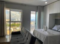 Apartamento Águas Claras, 13⁰ andar, nascente. Vista livre. Wi-Fi veloz. Academia e piscina. - Chambres d'hôtes Brasilia