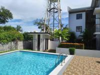 TriG Place AlmondDrive near SM Seaside with Wifi Netflix pool & parking - Chambres d'hôtes Tangke