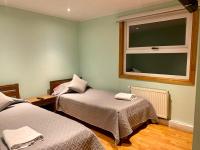 Camera Doppia con Letti Singoli con Bagno Privato 