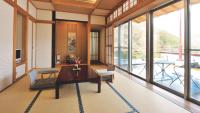 Japanese-Style Family Room with Hot Spring and Terrace with River View