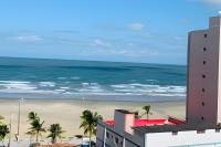 Apartamentos aconchegantes frente mar - B&B