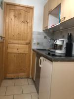 Appartement Station Le Corbier - Bed and Breakfast