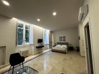 One-Bedroom Apartment with Balcony and City View