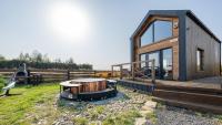 Domek Freedom Sun & Snow with sauna and jacuzzi - Chambres d’hôtes