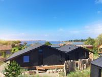 Werder Chalet -- L I E G E P L A T Z -- Ostsee Strand 150m I Sauna I eKamin I Ferienhaus an Ostsee bis 8 Pers I by "Meyers am Meer" - Chambres d'hôtes Boiensdorf