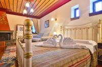 Chambre Familiale Deluxe avec Cheminée (2 Adultes + 2 Enfants)