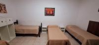 Single Bed in Dormitory Room