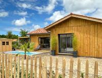 Maison en bois avec piscine proche de la plage - Chambres d’hôtes