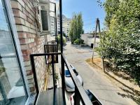 Three-Bedroom Apartment with Balcony