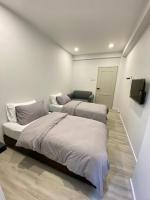 Camera Deluxe Doppia con Letti Singoli