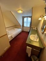 Camera Singola con Bagno in Comune