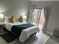 Carstens Garden Cottages - Chambres d’hôtes