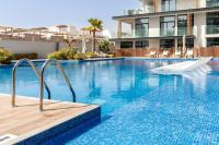 Waves - Comfortable JVC Apt with Balcony and Maids Room - Ferienwohnung Dubai