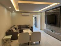 شقة عائلية غرفتين نوم وصالة ومطبخ-Family apartment with two bedrooms, a living room and a kitchen - B&B Riyadh