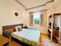 Suite casal com frigobar - Ferienwohnung