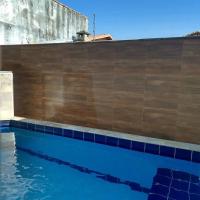 Casa em Itanhaém com 2 quartos garagem p 2 carros, churrasqueira, piscina 200 m da praia - B&B Itanhaém