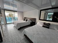 One-Bedroom Apartment with Balcony and City View